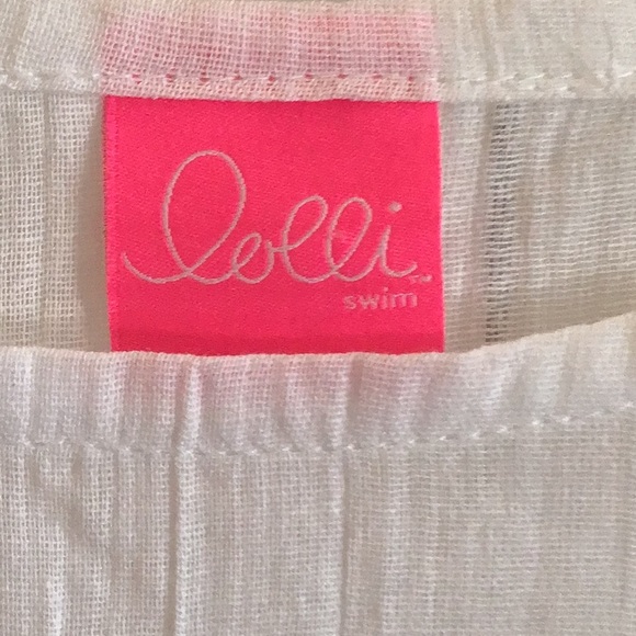 Lolli White cotton cover up with multi colored fringe. - Picture 3 of 7